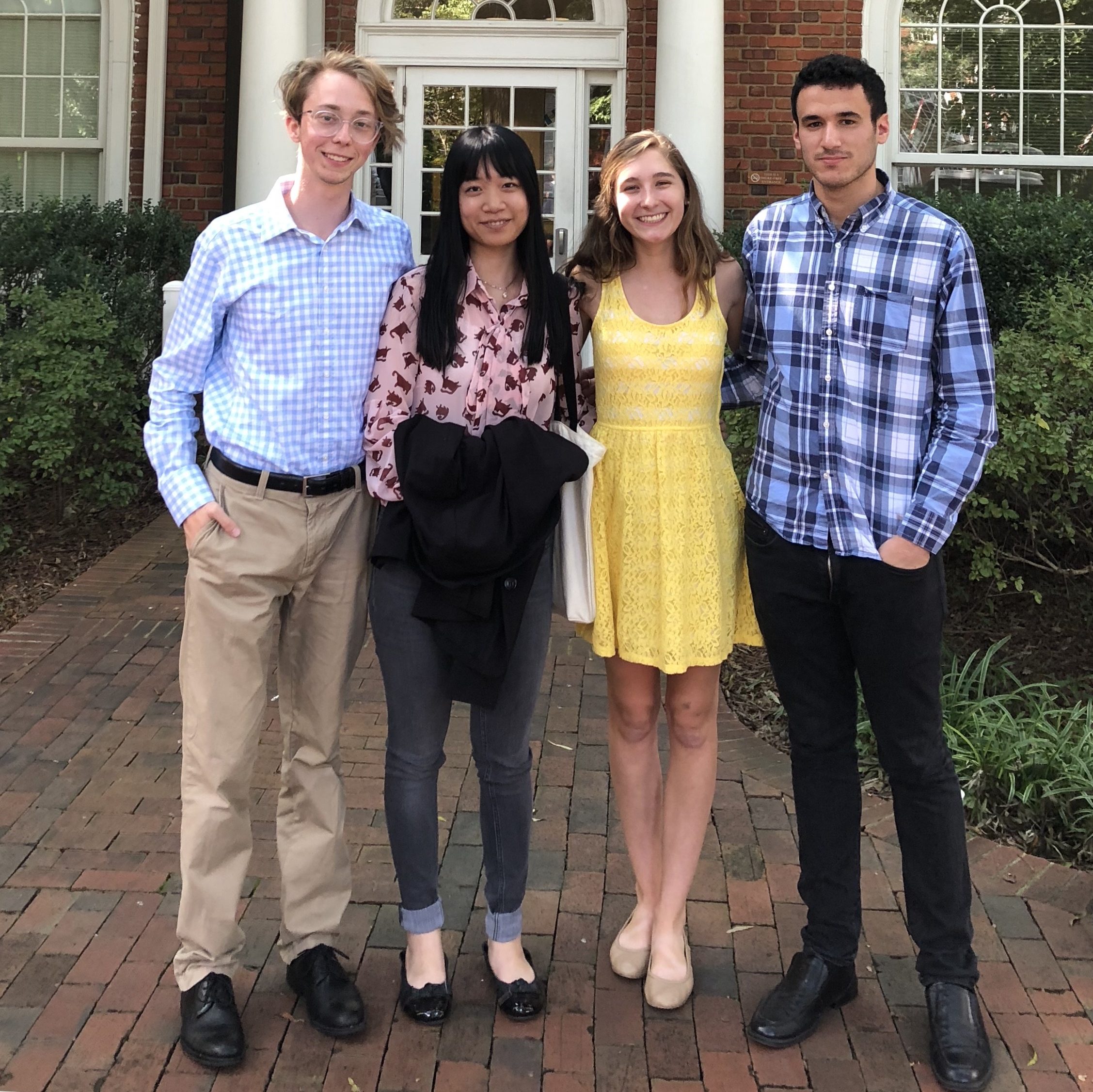 Jack Lloyd ('20), Yuzy Ye ('20), Cassidy Noble ('21) and Alec Jessar ('19) present their research at a conference at Elon University.