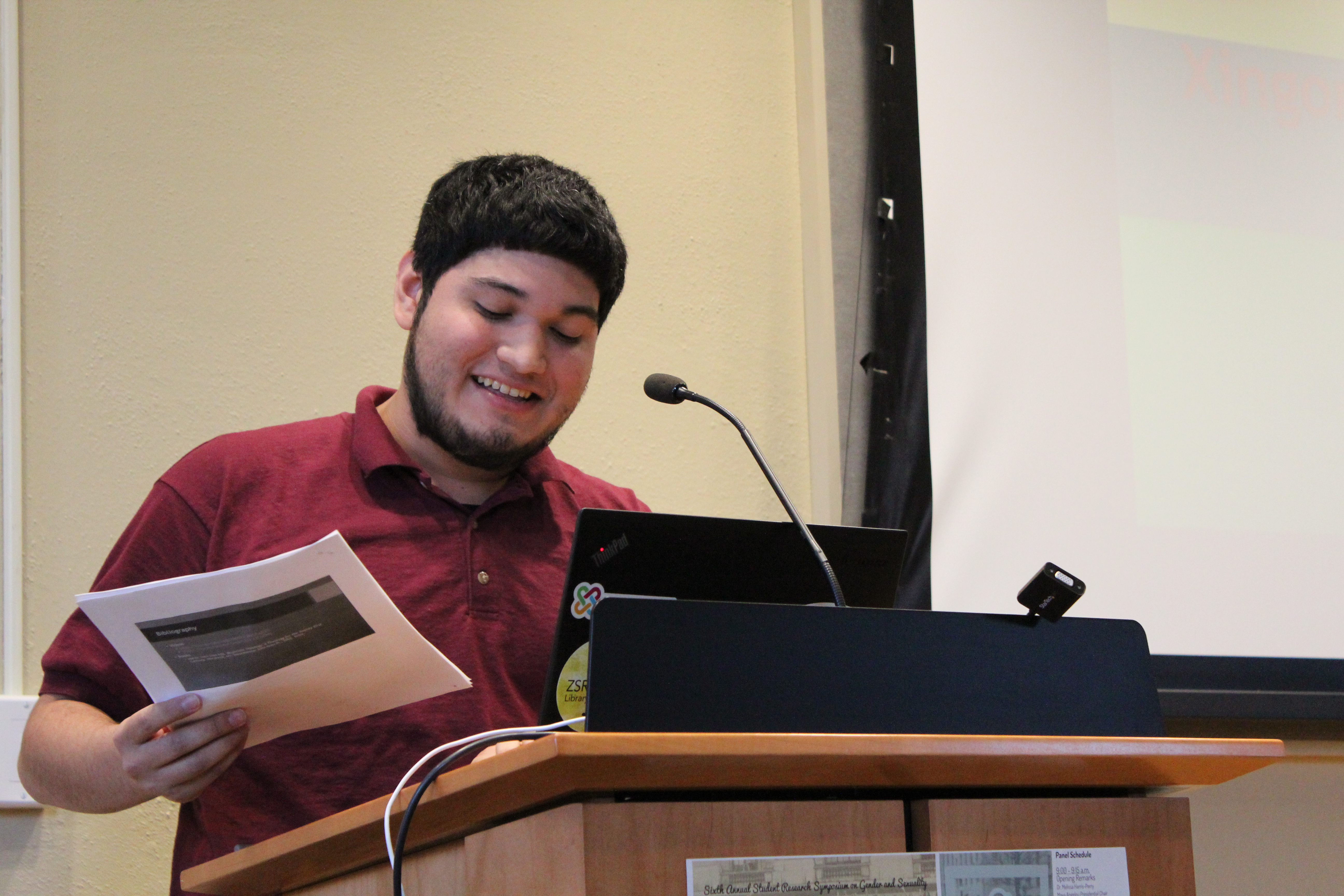 Student speaking at podium