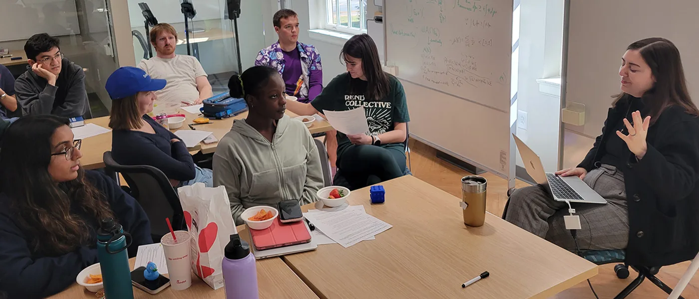 Faculty and students at a seminar in the Math and Stats center