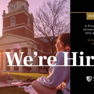 Wake Forest University hiring graphic. Two people sit on a blanket on a campus lawn at sunset near a brick building with a clock tower. A black and gold panel and large white lettering read: “#WorkAtWake. A Private Liberal Arts University in the City of Arts and Innovation. Grow your career in the forest. We’re Hiring.” The Wake Forest University name and logo appear at lower right.
