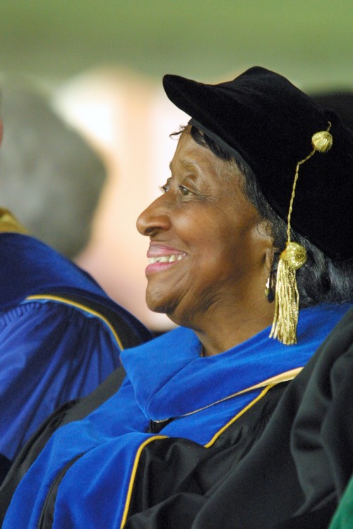 Dr. Dolly McPherson smiles in her doctoral regalia at the 2001 WFU Commencement Ceremony.