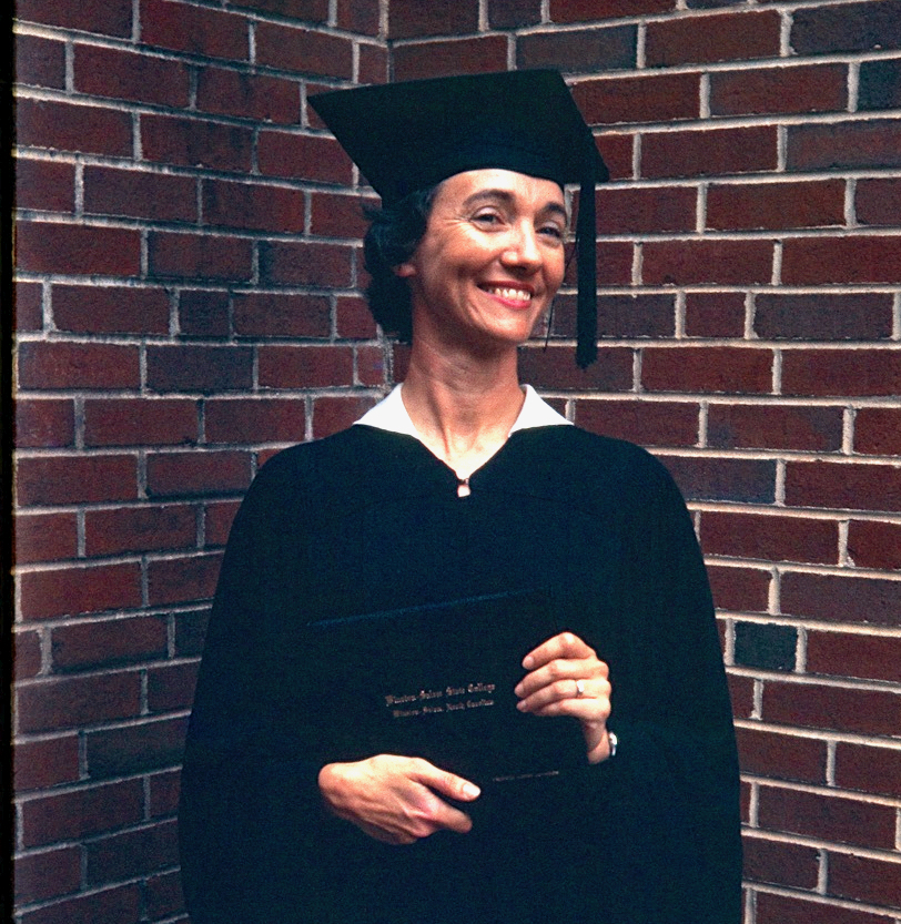 Lecturer Emerita Patricia Johansson poses in cap and gown with her diploma from Winston-Salem State University. Photo posted with her obituary by Reed Johansson.
