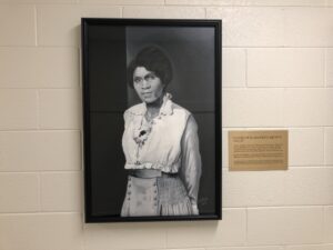 Photo from the portrait unveiling event showing one of the portraits