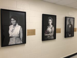 Photo from the portrait unveiling event showing the portraits