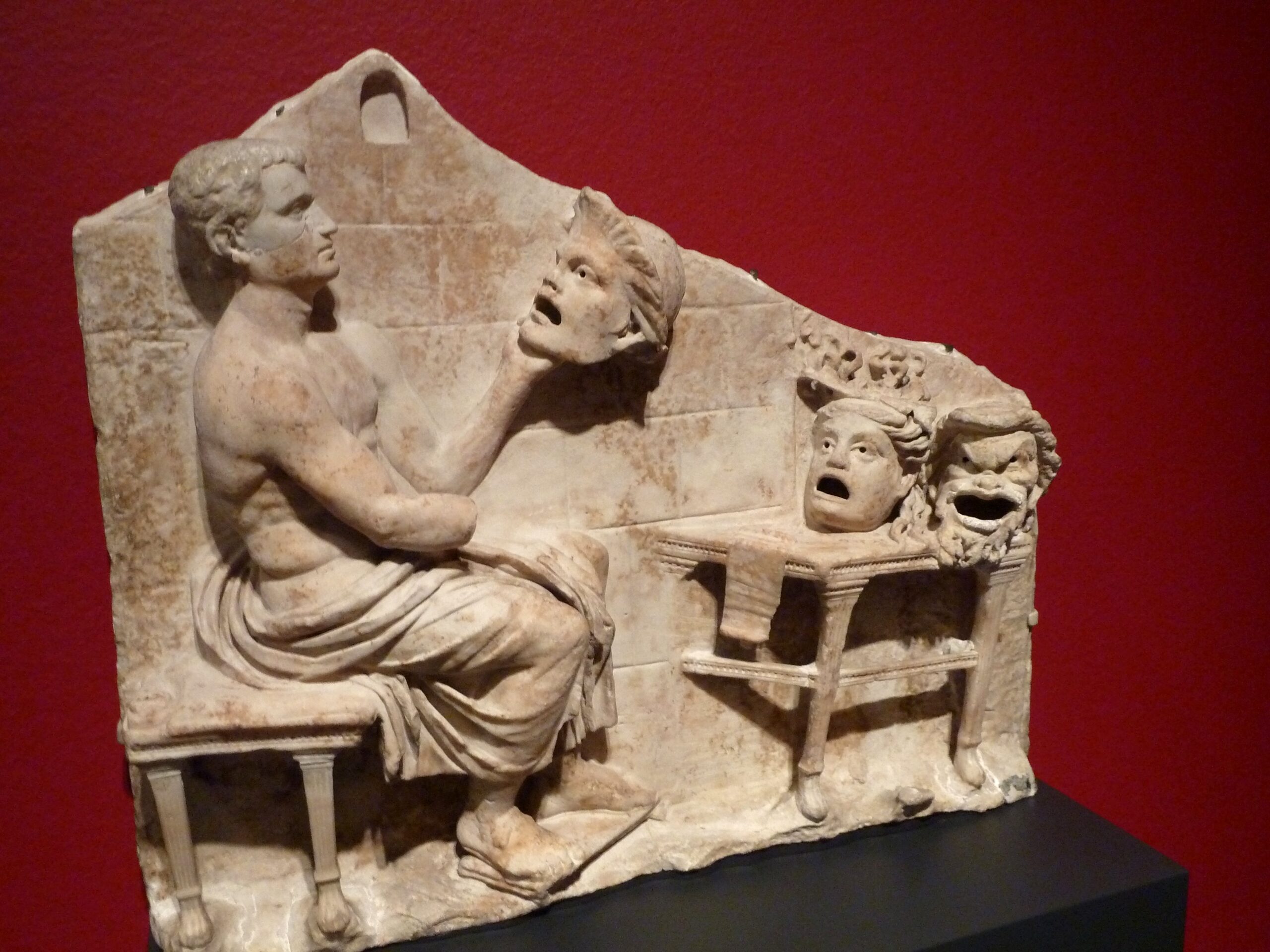 Relief with Menander and New Comedy Masks (Roman, AD 40-60) - the masks show three of his canonical New Comedy characters: youth, false maiden, old man
