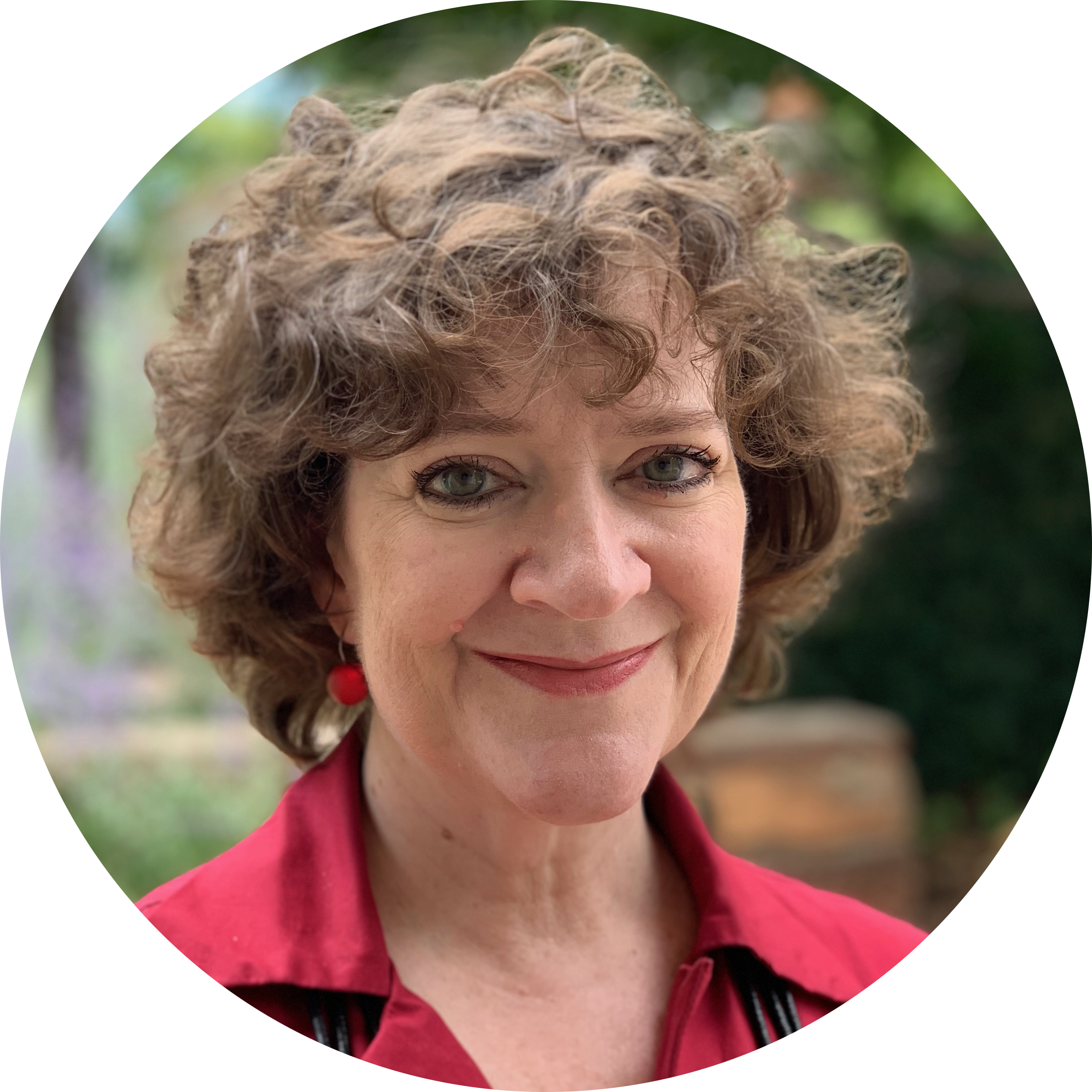 Profile picture of Alison Futrell: a white woman with brown hair. She is smiling and wearing a red v-neck.