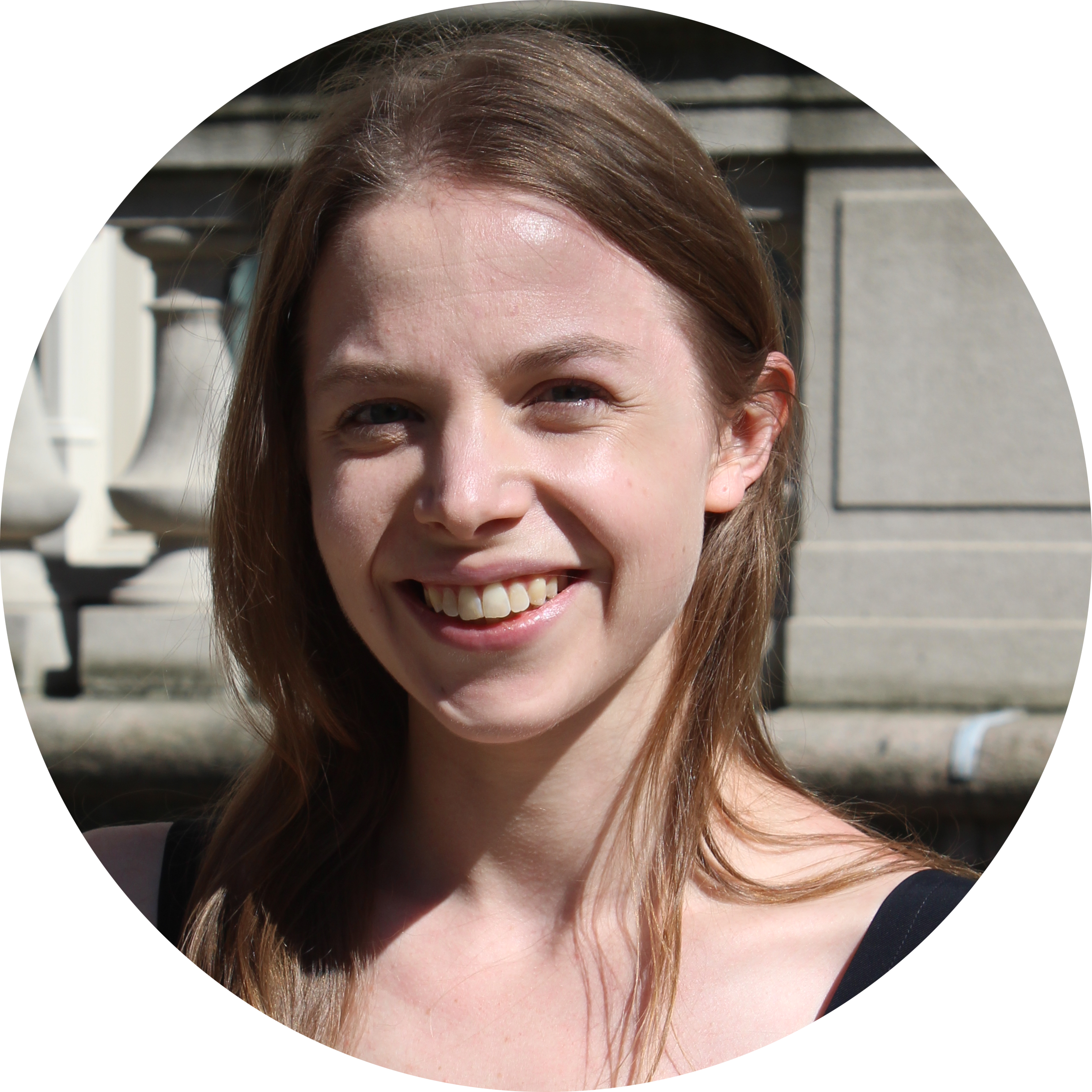 Profile picture of Elizabeth Heintges: a white woman with brown hair. She is smiling and wearing a black tank top.