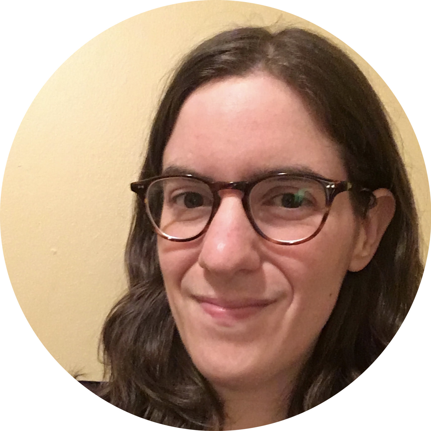 Profile picture of Madelaine Thompson: a white woman with brown hair. She is half-smiling and wearing tortoise-shell glasses.
