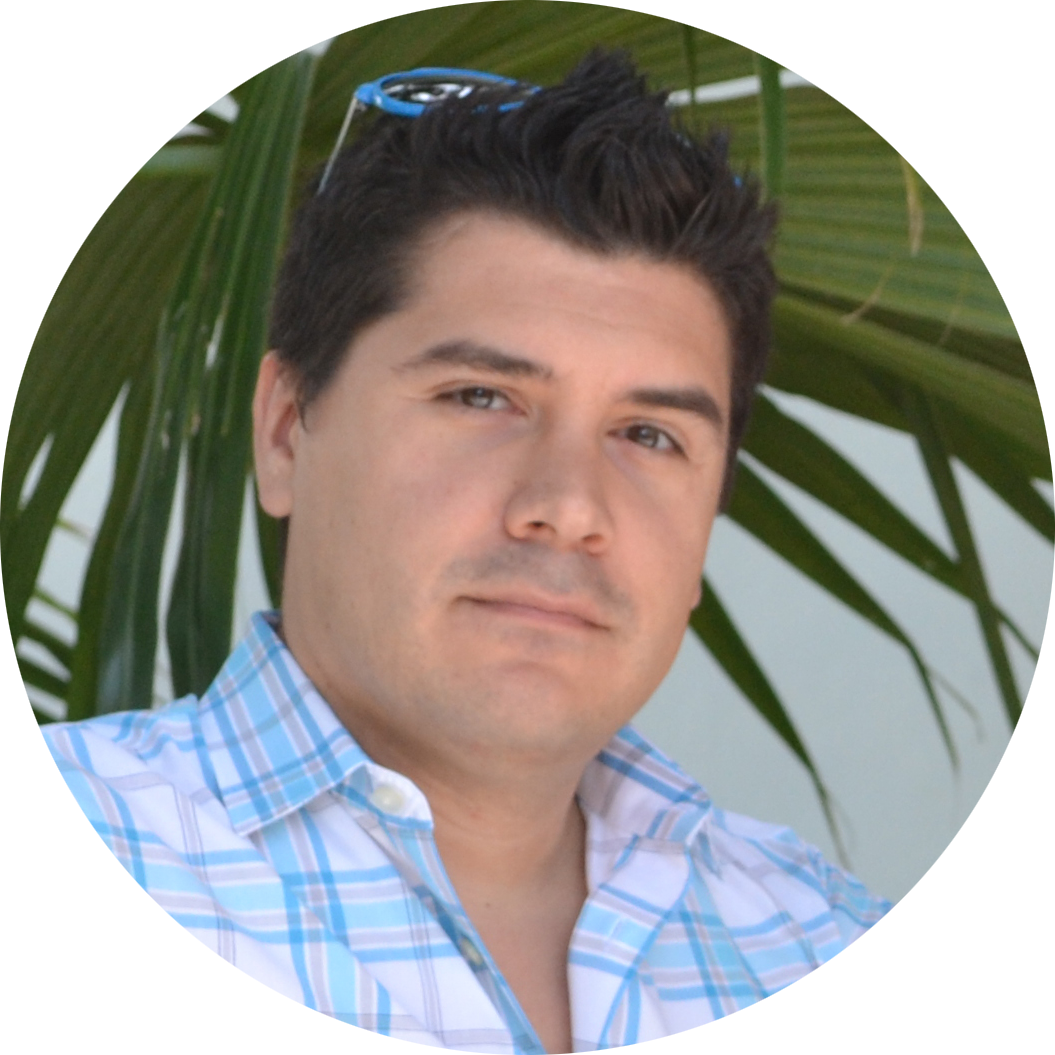 Profile picture of Brian D. Valencia: a man with light tan skin and spiky black hair. He is wearing a checkered shirt of various shades of blue and has blue sunglasses resting atop his head.