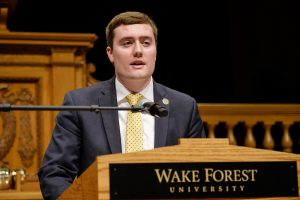 Photo of Kyle Tatich giving his Senior Oration.