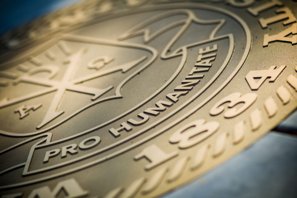 Wake Forest University seal with the words pro humanitate