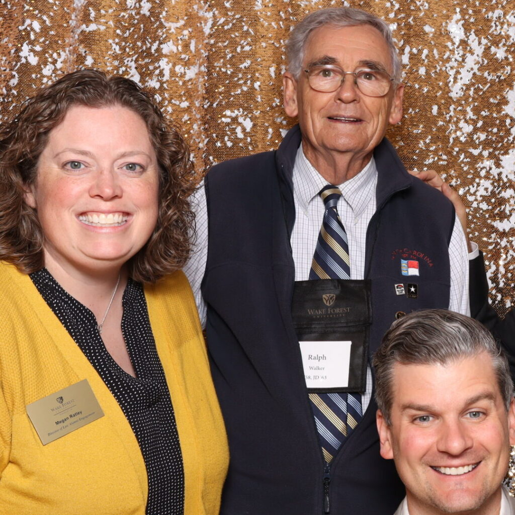 Megan Ratley, Ralph Walker, and Logan Roach posing for a photo.
