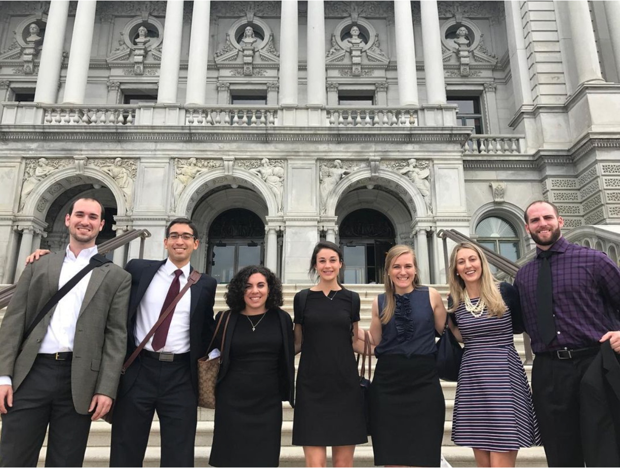 Law students posing outside of the 4th Circuit Court of Appeals with Professor Abigail Perdue.