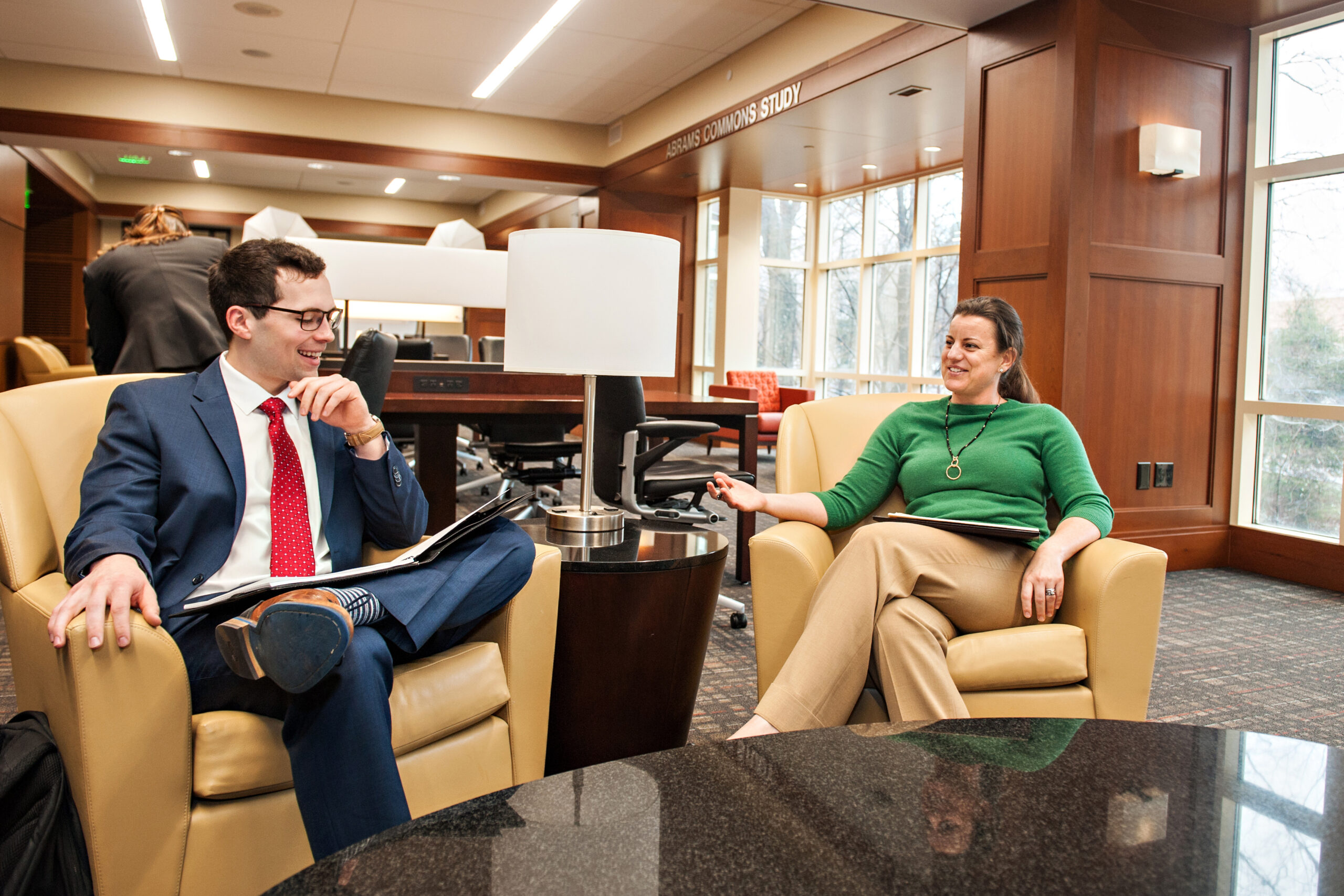 Career advisor consulting with a law student in the Wake Forest commons.
