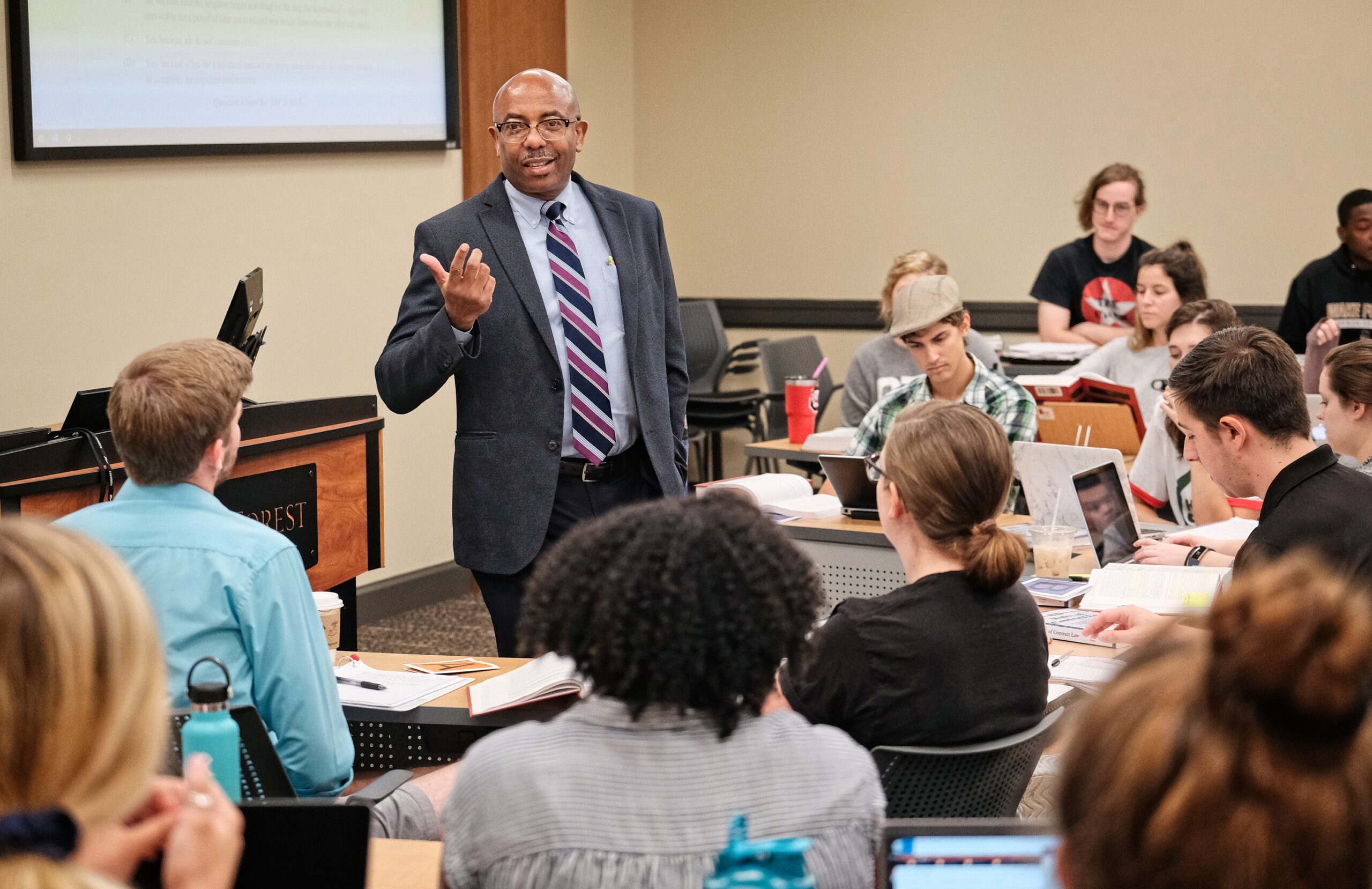 Wake Forest Law professor teaching in front of a class. 