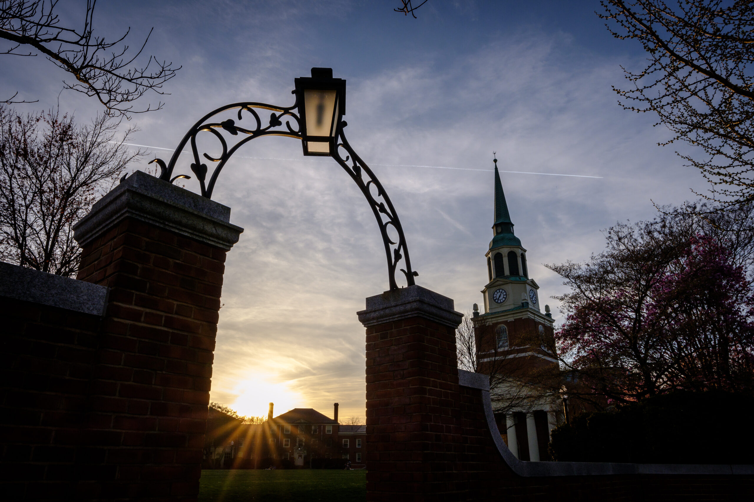 A open archway with Wait Chapel in the background at the Wake Forest campus.