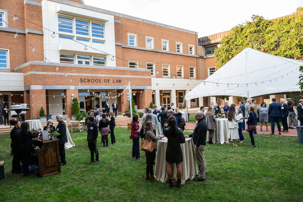 A large group of Wake Forest alumni celebrating law alumni weekend.