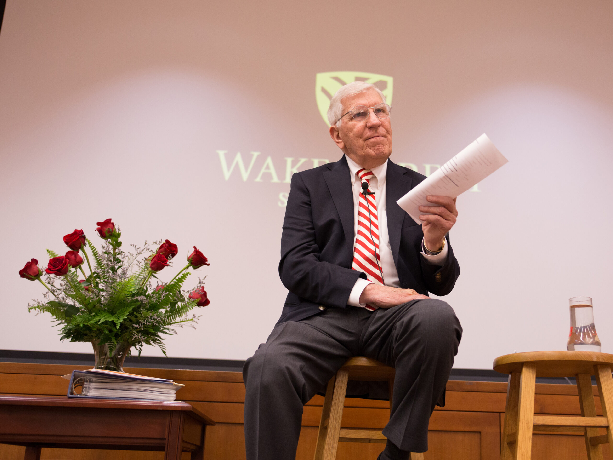 Charlie Rose giving a lecture. 