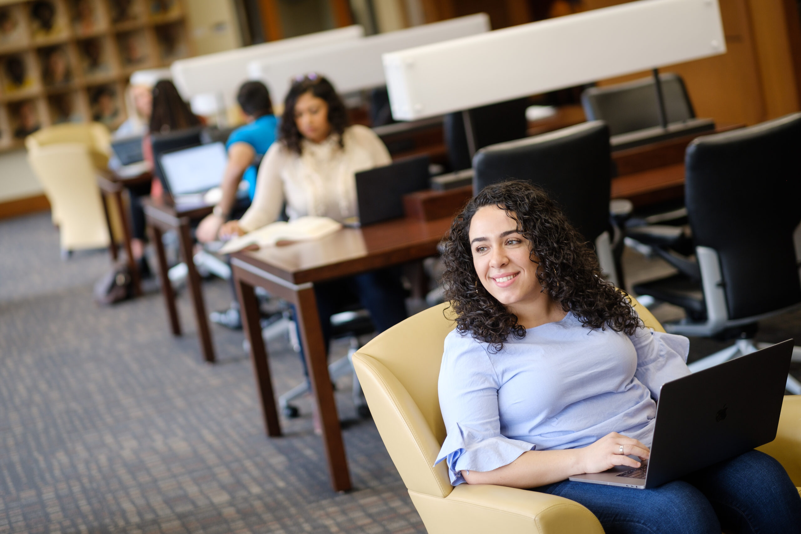 A Wake Forest Law student studying in the commons.