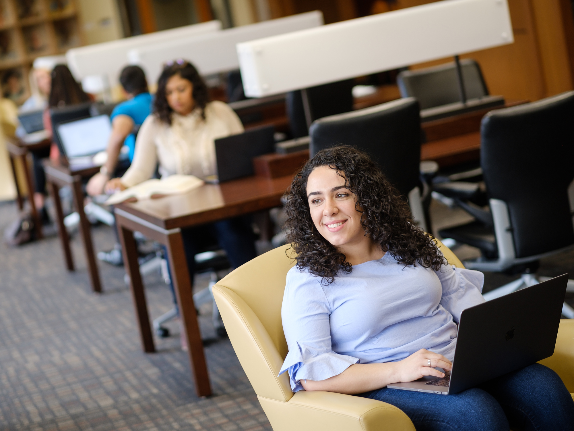 A Wake Forest Law student studying in the commons.