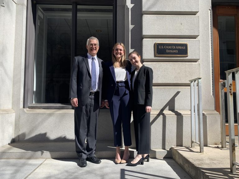 Professor John Korzen with Chelsey Phelps and Jacqueline Winters.