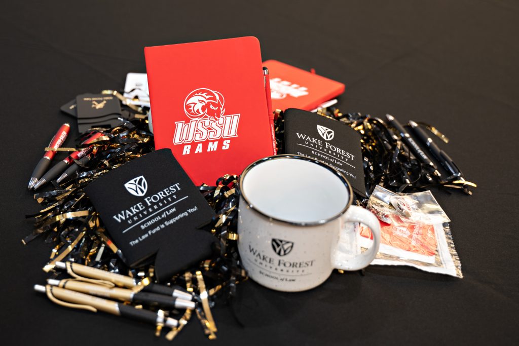 Wake Forest Law and WSSU swag used as a centerpiece on a table