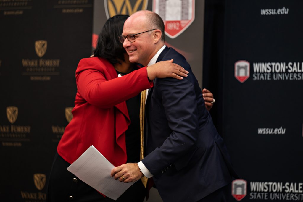 WSSU Chancellor Bonita Brown embraces Wake Forest Law Dean Andy Klein