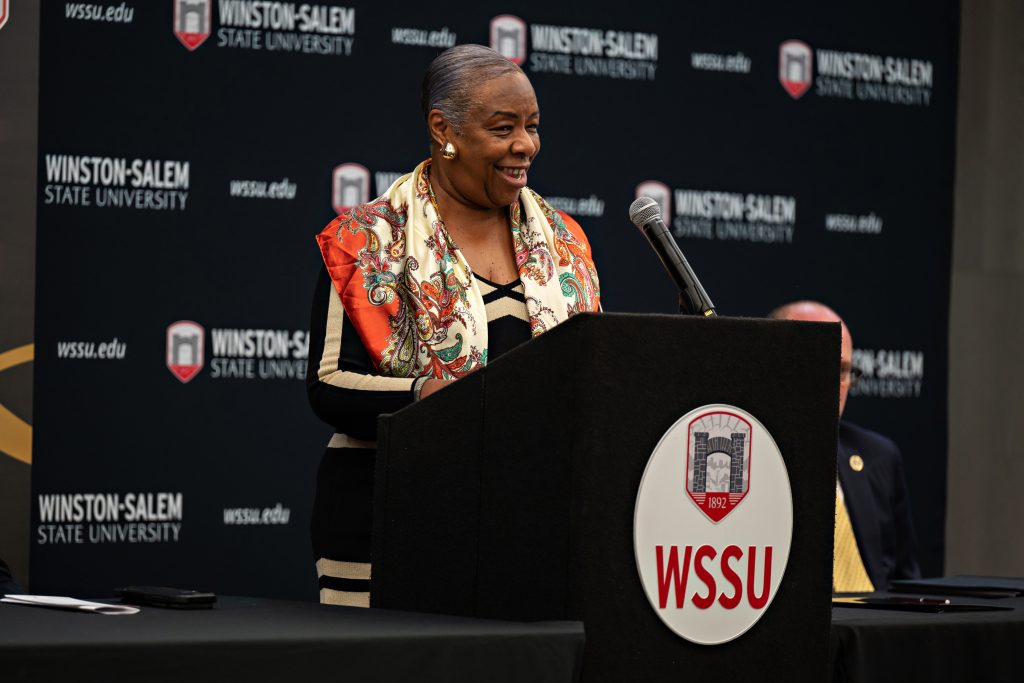 Judge Denise Hartsfield speaks at the podium