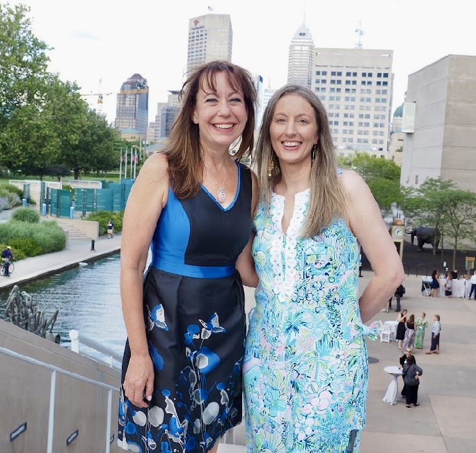 Professor Abby Perdue and another Legal Writing Institute member (woman)