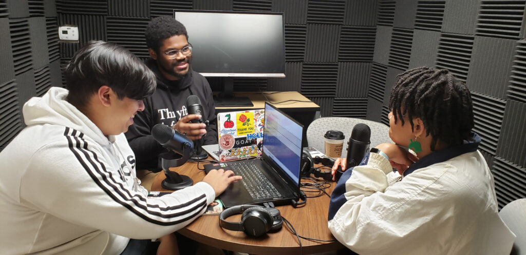 Students recording a podcast