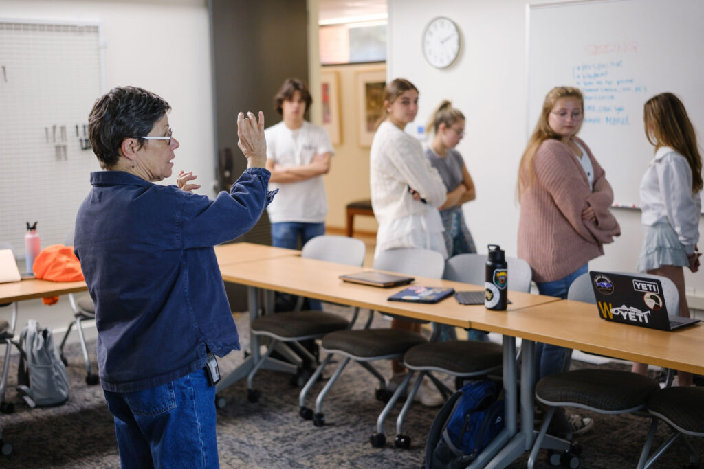 Wake Forest professor of art Leigh Ann Hallberg teaches her first year seminar, Discovering the Avant-Garde, in Scales Fine Arts Center room 103. The students use the whiteboards on the walls for an exercise.