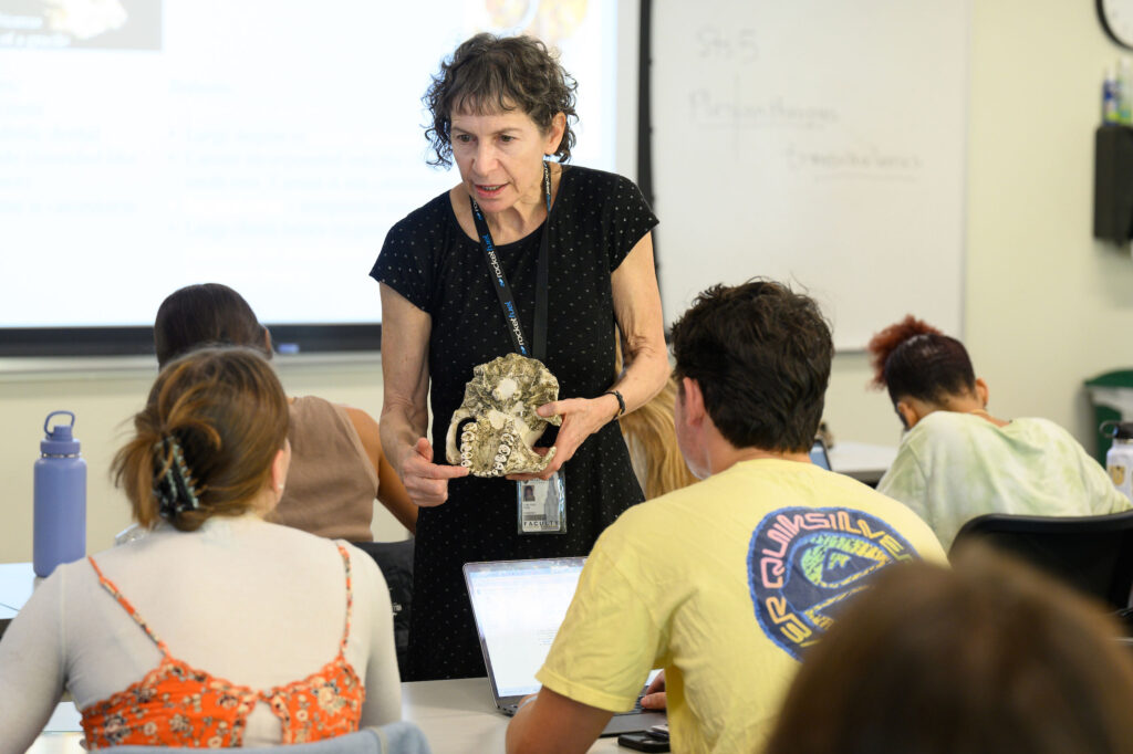 Professor of physical anthropology Ellen Miller teaches a Biological Anthropology class in Piccolo 122.