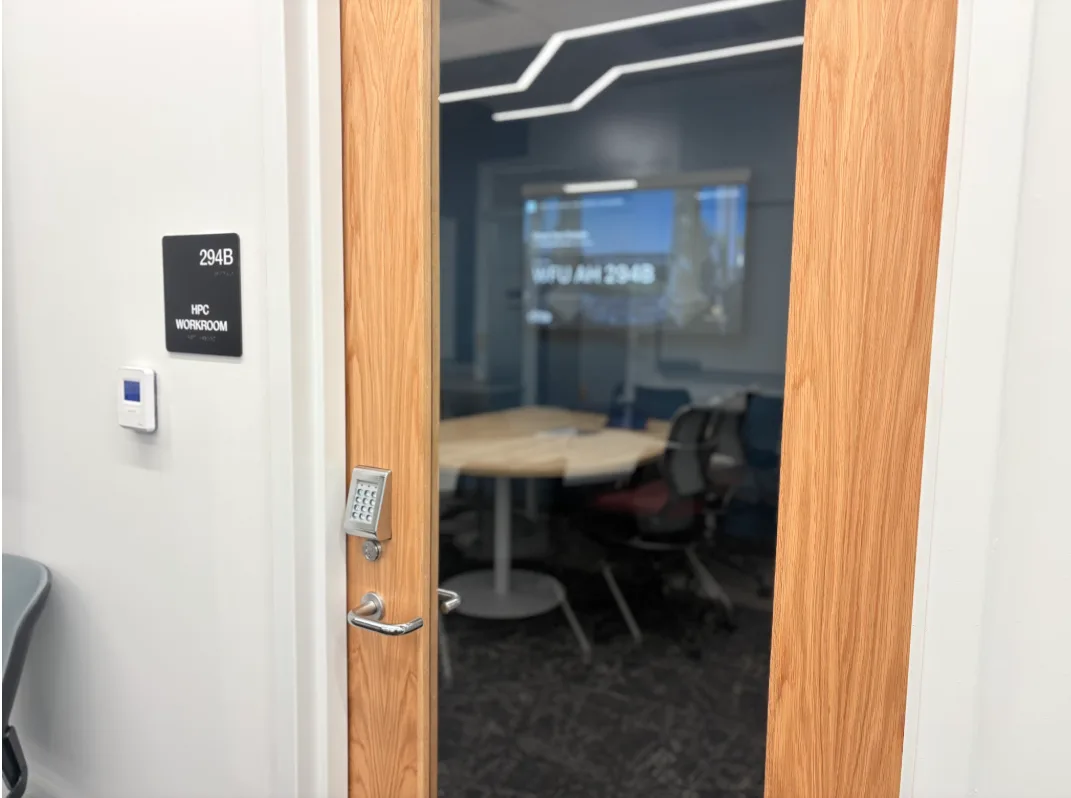 A garage-style door brings in natural light from the Computer Science lounge skylight and creates open and welcoming access for drop-in hours from 10-2 every day. When closed, the area becomes a quieter space for gatherings.