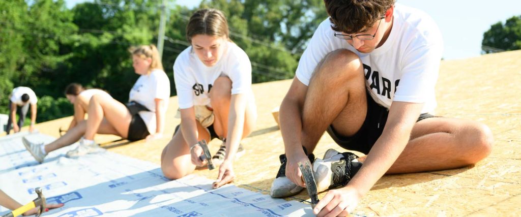 Wake Forest University SPARC Pre-Orientation Program students volunteer at a Habitat for Humanity house build.