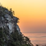 A silhouette view of Pilot Mountain's knob at sunrise.