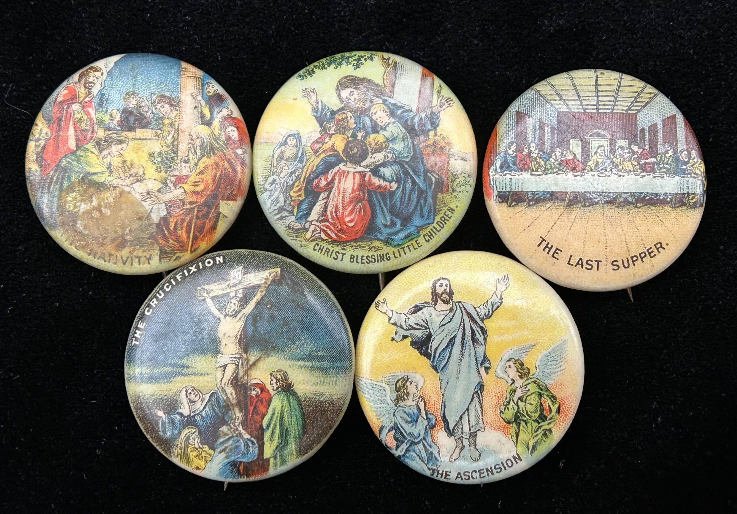 Figure 3: Pinback buttons featuring central moments in the life of Jesus by Whitehead & Hoag. Photo by author.