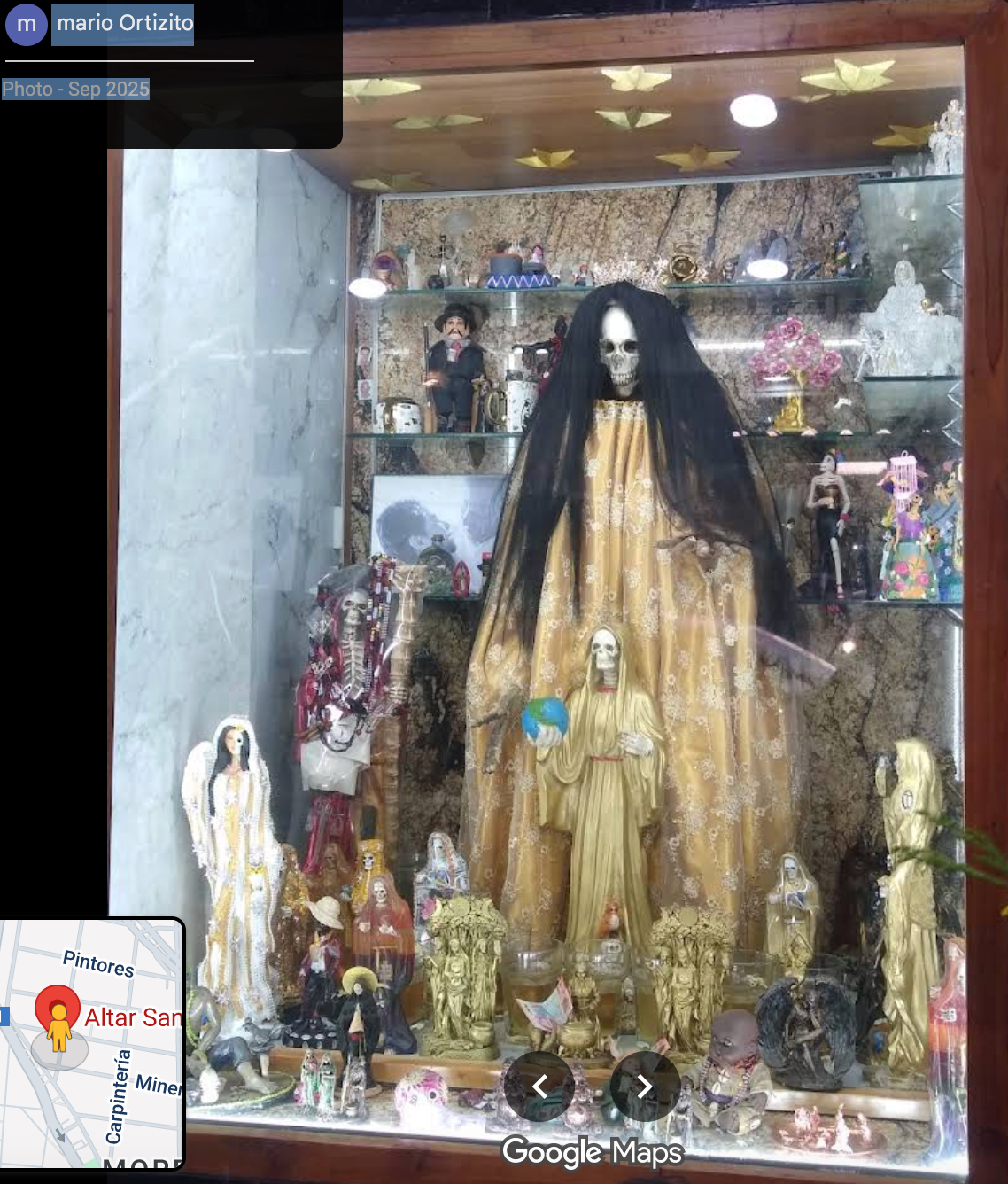 Figure 1. Dress of La Santa Muerte in Enriqueta Romero’s altar for the Saint. Photograph by Mario Ortizito from Google Maps Images 2025. Fair use.