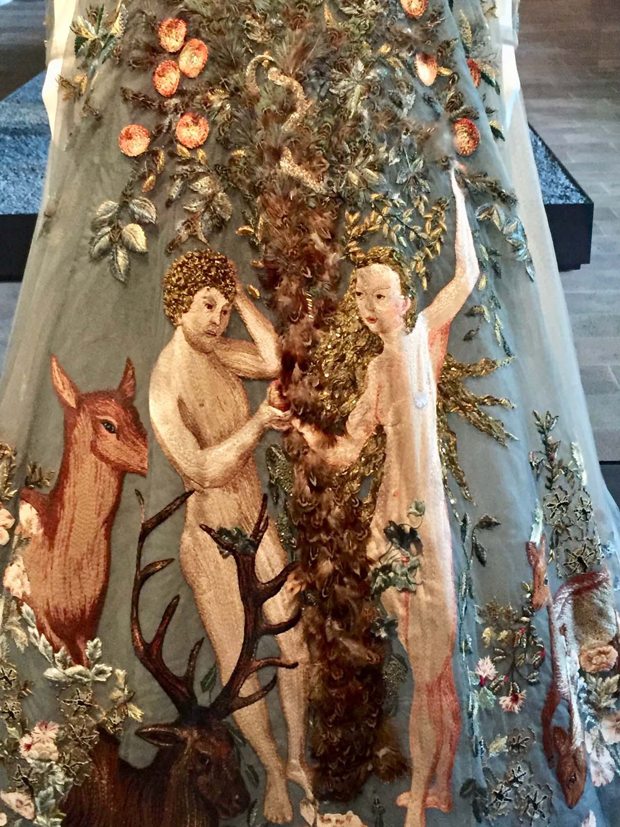 Figure 2: Close-up of silk embroidery featuring Adam and Eve. Photograph © Lynn S. Neal.