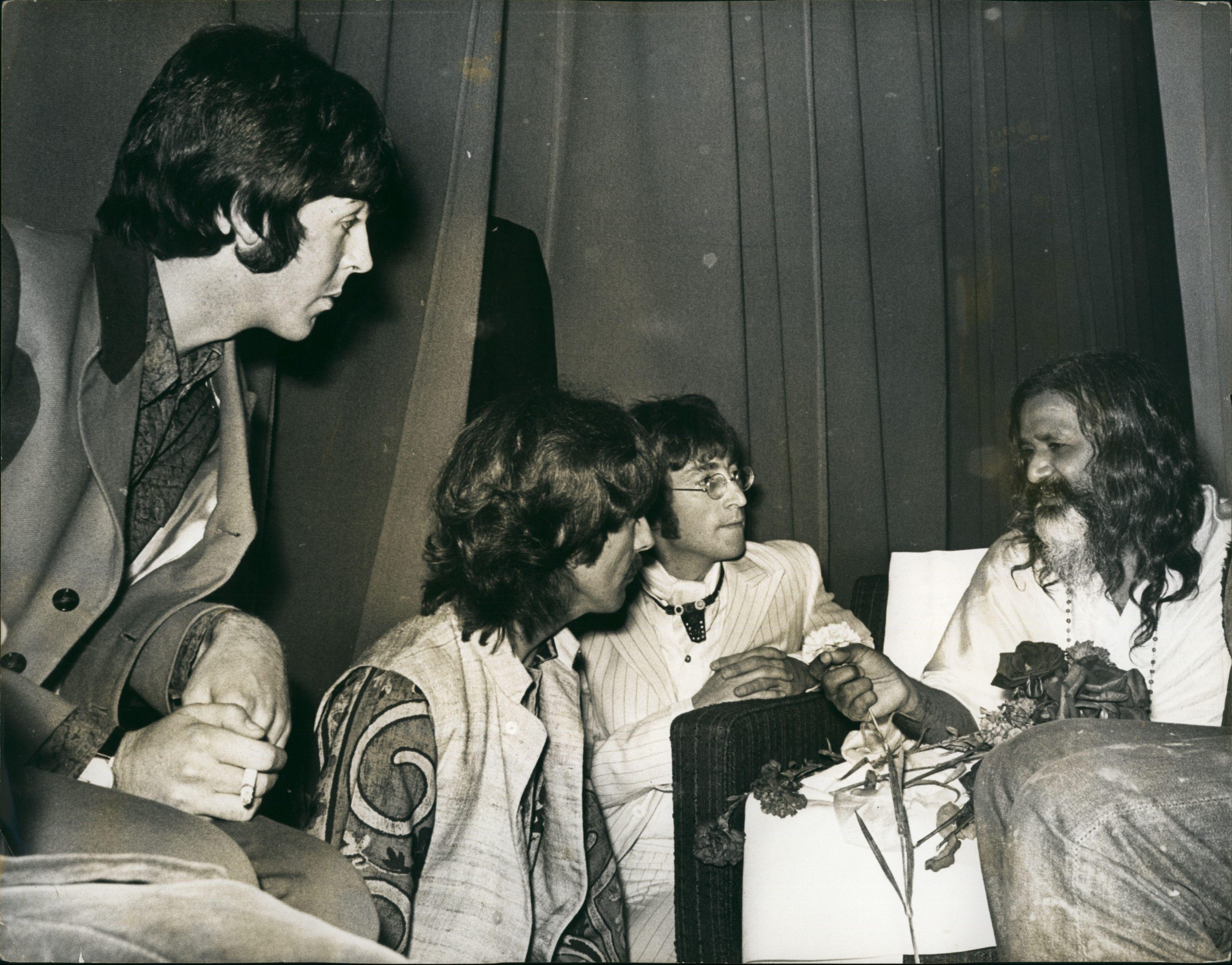 Figure 2: Paul McCartney, George Harrison, and John Lennon with Maharishi Mahesh Yogi at a lecture in London, 1967. Photograph © Keystone Pictures/Zuma Press/Alamy.