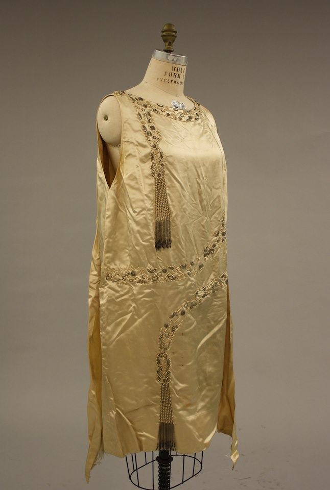 Figure 3: Wedding dress. 1920s. Silk, glass beads. Cornell Textile + Fashion Collection, ID: 2021.03.001ab. Gift of Carol Greenhaus. 