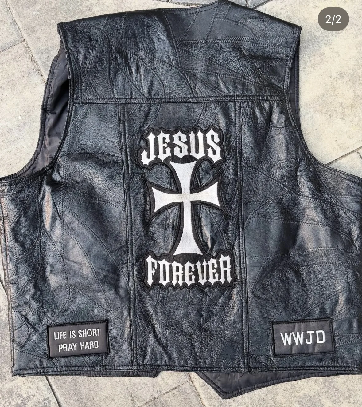 Figure 2: Back view of moto vest and evangelical Christian patches. Photograph © author.