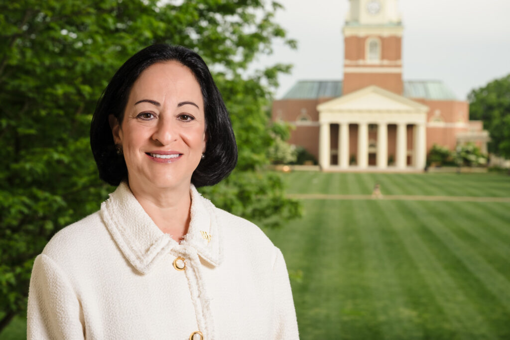 Jackie Travisano in front of Wait Chapel