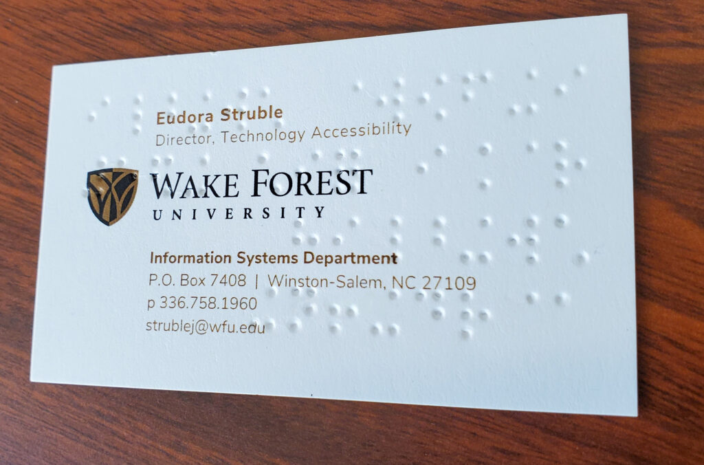 an image of the WFU business card highlighting brailling