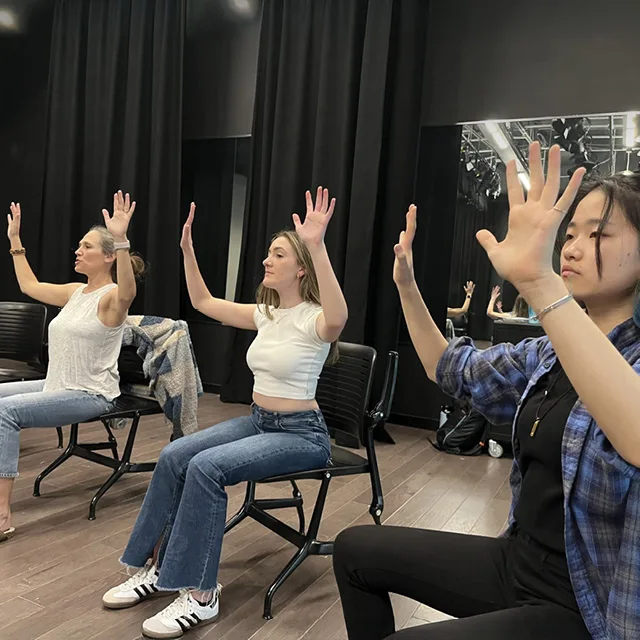 Seated movement class in progress