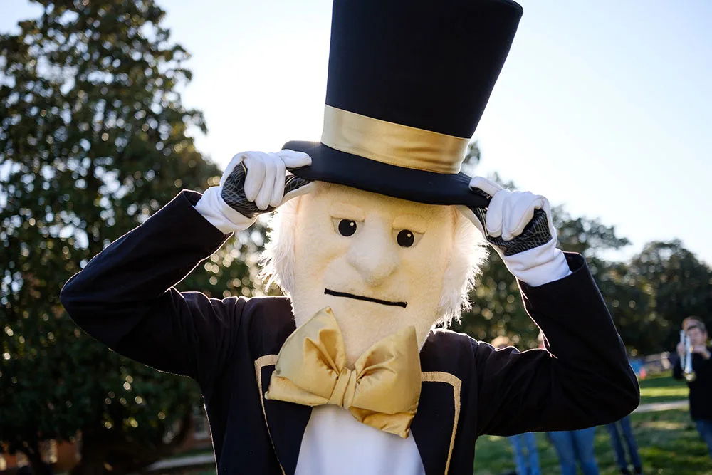 The Demon Deacon mascot poses for a photo.