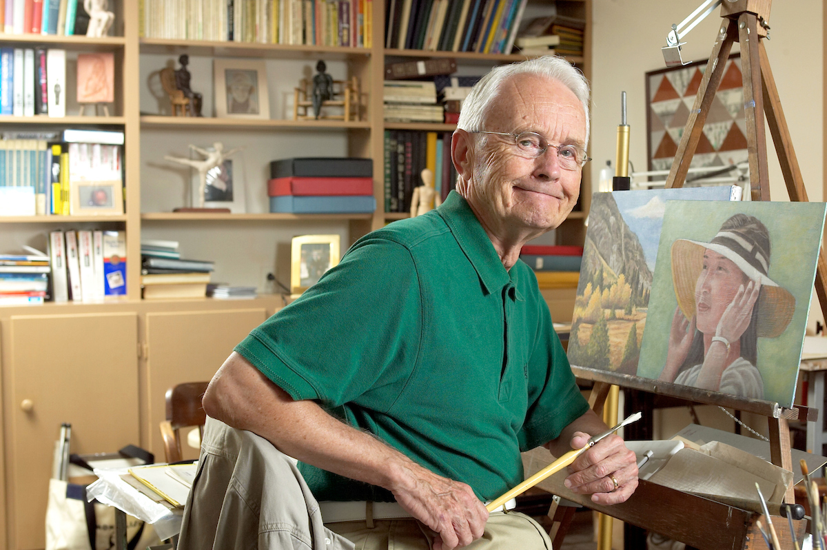 Retired Wake Forest communication professor Julian Burroughs in the art studio in the basement of his Faculty Drive home in 2004.