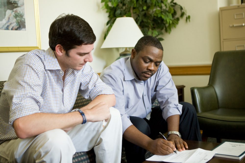 James Beshara (at left) started a study-abroad fund with the help of professor Sylvain Boko.