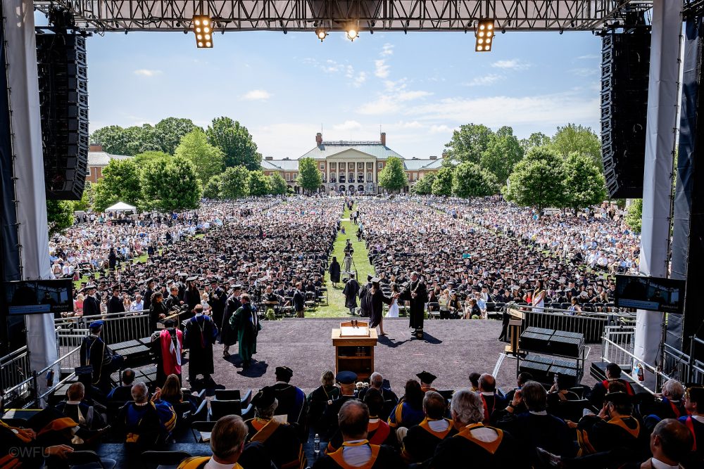 President Nathan O. Hatch shakes hands with each graduate as they cross the stage.