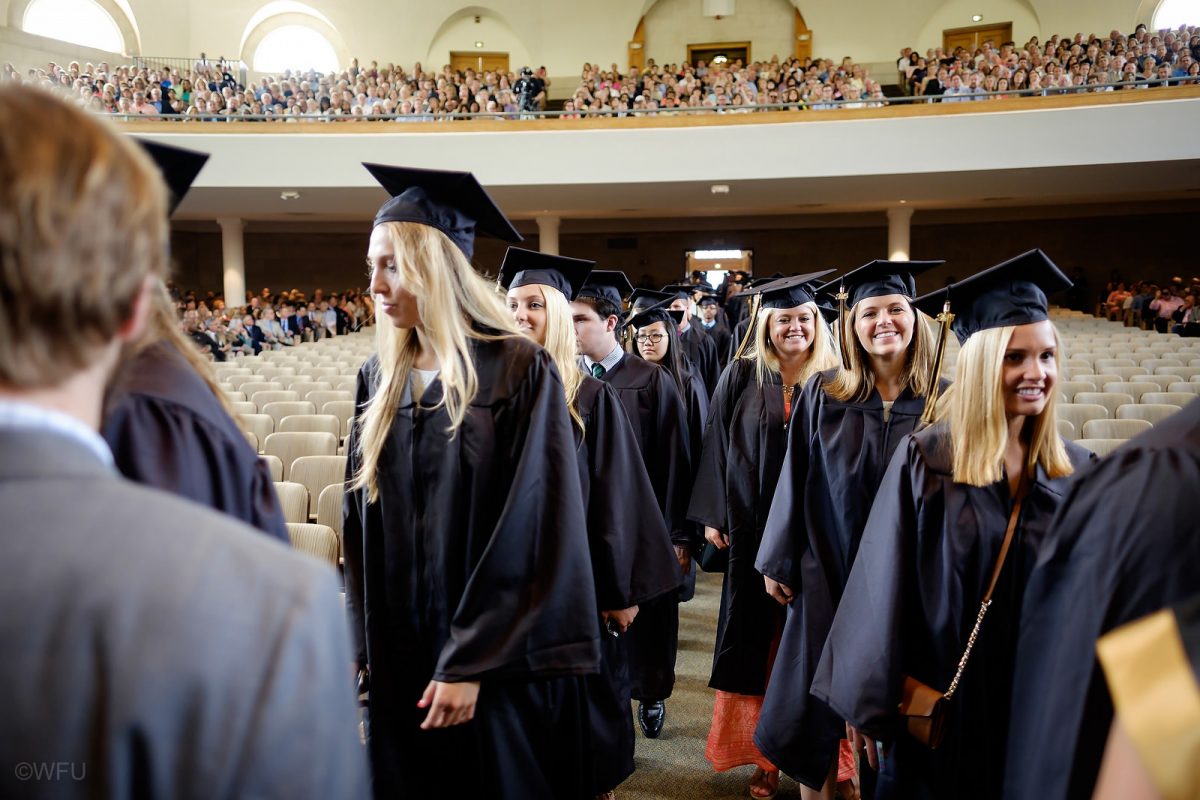 Students walk into the chapel in the processional.