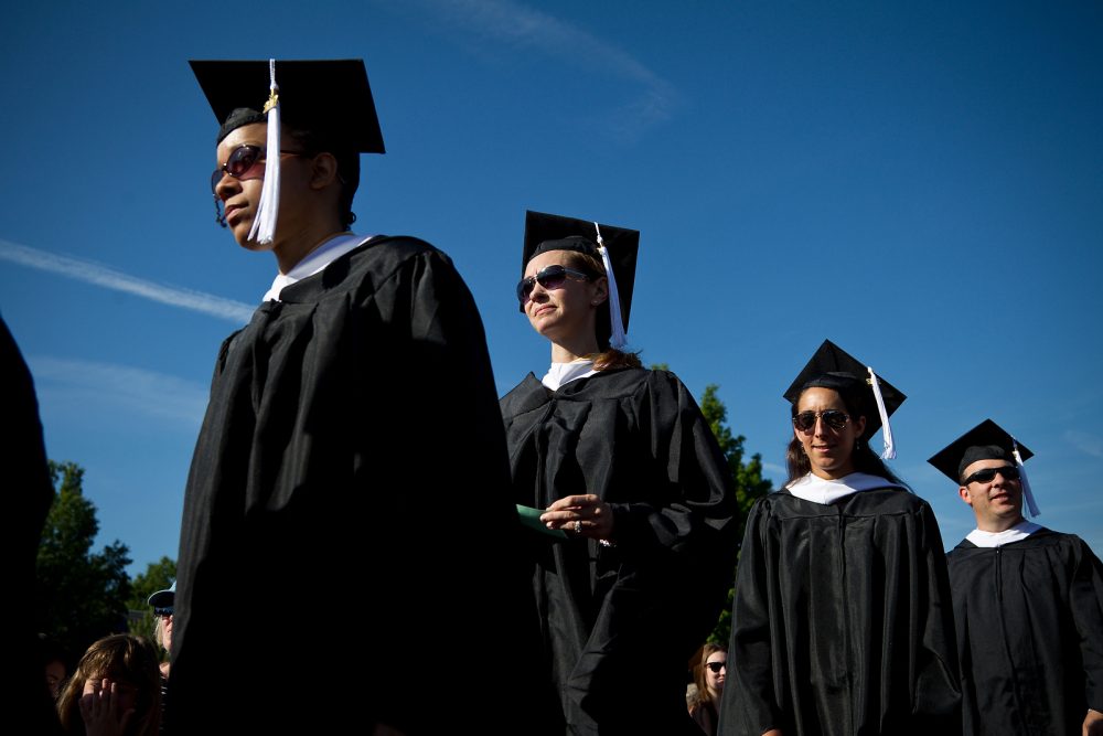 Graduates file into their seats in front of Wait Chapel.